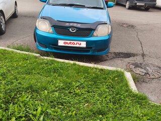 2001 Toyota Corolla Runx IX (E120, E130), зелёный, 529000 рублей, вид 2
