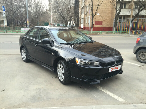 2012 Mitsubishi Lancer X Рестайлинг, чёрный - вид 2