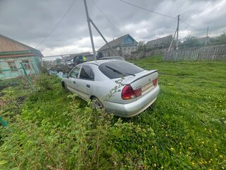 1998 Mitsubishi Carisma I, серый, 125000 рублей, вид 5
