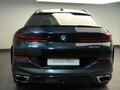 2025 BMW X6 40i III (G06) Рестайлинг, синий, 13450000 рублей - вид 3