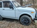 1995 Lada (ВАЗ) 2121 (4x4) I Рестайлинг, белый, 380000 рублей - вид 2