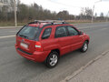 2009 Kia Sportage II Рестайлинг, красный - вид 2