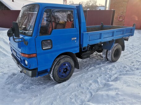 1988 Nissan Atlas, синий, 2000000 рублей, вид 4