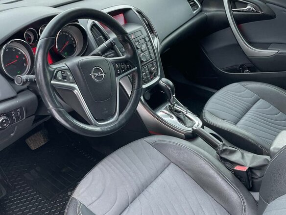 2013 Opel Astra J Рестайлинг, коричневый, 828000 рублей - вид 3