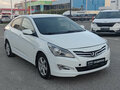 2014 Hyundai Solaris I Рестайлинг, белый - вид 2