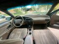 1995 Ford Taurus III, зелёный - вид 3