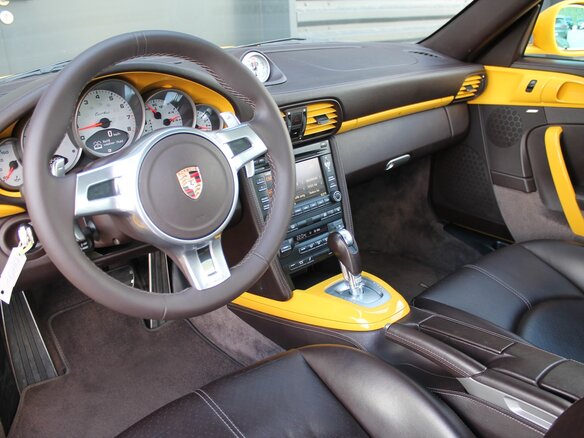 2009 Porsche 911 Turbo VI (997) Рестайлинг, жёлтый - вид 5