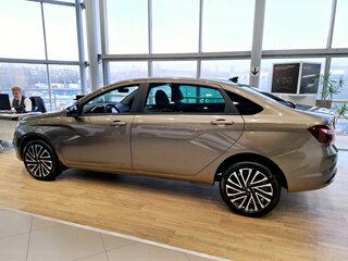 2024 Lada (ВАЗ) Aura, коричневый, 2810500 рублей, вид 2