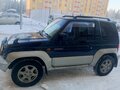 1996 Mitsubishi Pajero Junior, чёрный, 450000 рублей - вид 3