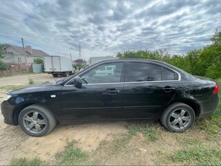 2010 Kia Magentis 5-speed II Рестайлинг, чёрный, 900000 рублей, вид 4