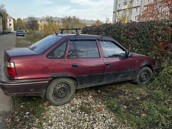 2005 Daewoo Nexia I, пурпурный, 100000 рублей - вид 2