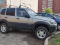 2009 Chevrolet Niva I Рестайлинг, серый, 450000 рублей - вид 1