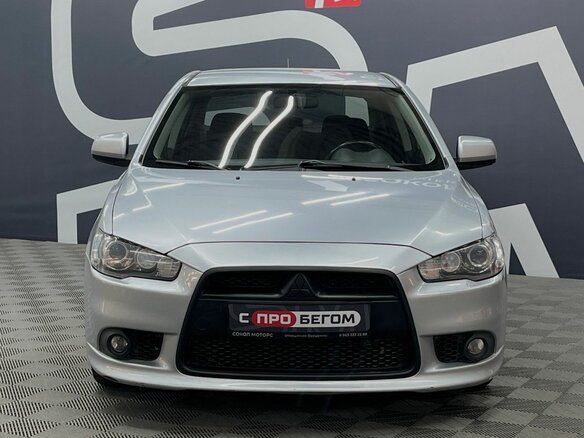 2012 Mitsubishi Lancer X Рестайлинг, серебристый - вид 1