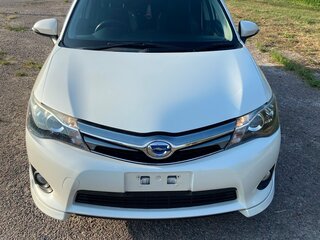 2013 Toyota Corolla Fielder XI (E160, E170, E180), белый, 1450000 рублей, вид 2