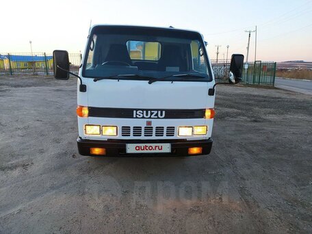 1989 Isuzu Elf (N-series), белый, 1150000 рублей, вид 1