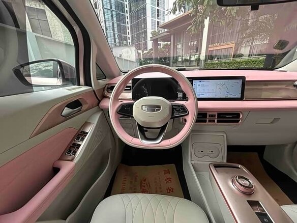 2023 Geely Geometry E 39.4 kWh, розовый - вид 18