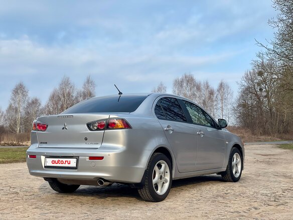 2011 Mitsubishi Lancer X Рестайлинг, серебристый, 805000 рублей - вид 3