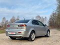 2011 Mitsubishi Lancer X Рестайлинг, серебристый, 805000 рублей - вид 3