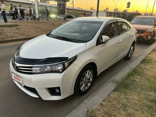 2013 Toyota Corolla XI (E160, E170, E180), белый, 1650000 рублей, вид 2