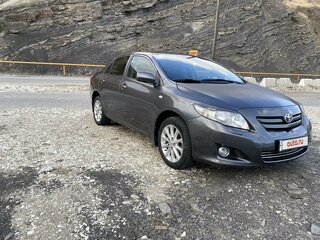 2007 Toyota Corolla X (E140, E150), серый, 710000 рублей, вид 2