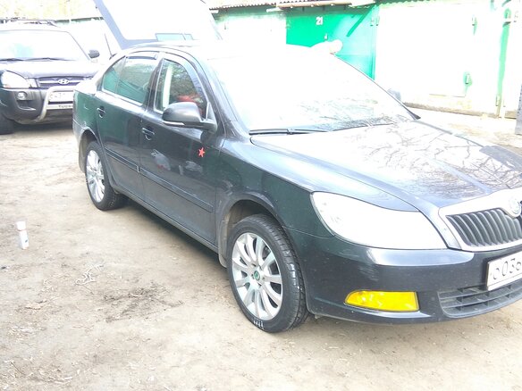 2013 Skoda Octavia II (A5) Рестайлинг, чёрный - вид 1