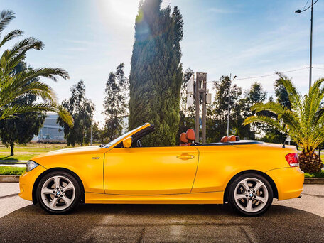 2011 BMW 1 серии 125i I (E82/E88) Рестайлинг 2, жёлтый, 1555000 рублей, вид 5