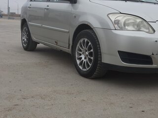 2005 Toyota Corolla IX (E120, E130) Рестайлинг, серебристый, 260000 рублей, вид 3