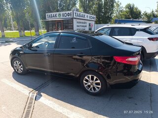 2011 Kia Rio III, чёрный, 575000 рублей, вид 4
