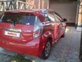 2014 Toyota Aqua I, красный, 760000 рублей