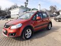 2011 Suzuki SX4 I (Classic) Рестайлинг, оранжевый