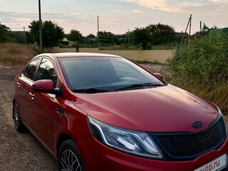 2013 Kia Rio 5-speed III, красный, 1000000 рублей, вид 1
