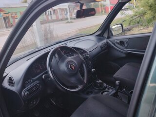 2014 Chevrolet Niva I Рестайлинг, серый, 595000 рублей, вид 3