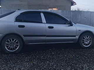 2003 Mitsubishi Carisma I Рестайлинг, серебристый, 219000 рублей, вид 5