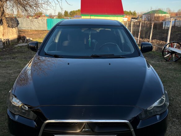 2013 Mitsubishi Lancer X Рестайлинг, чёрный, 900000 рублей - вид 3