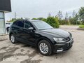 2017 Volkswagen Tiguan II, чёрный - вид 2
