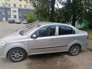 2011 Chevrolet Aveo I Рестайлинг, серебристый, 300000 рублей, вид 2