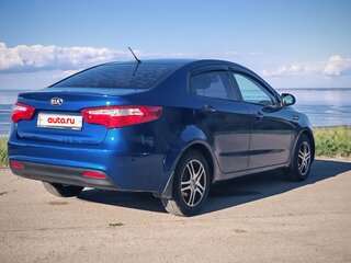 2014 Kia Rio 5-speed III, синий, 750000 рублей, вид 4