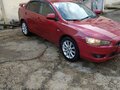 2007 Mitsubishi Lancer X, красный, 650000 рублей - вид 6