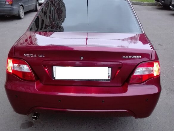 2009 Daewoo Nexia I Рестайлинг, красный - вид 1