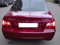 2009 Daewoo Nexia I Рестайлинг, красный - вид 1