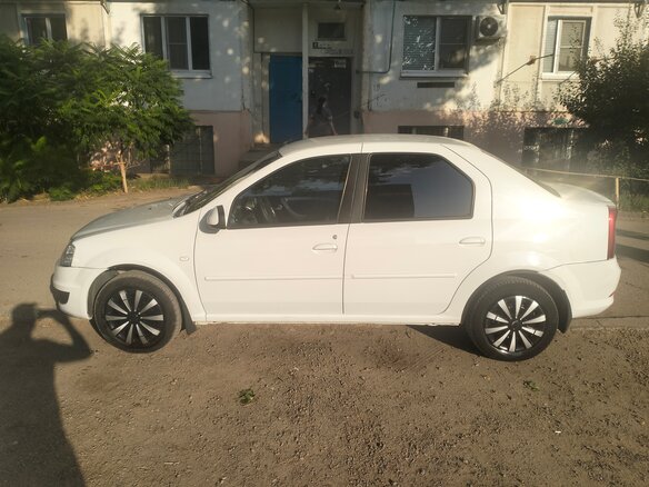 2011 Renault Logan I Рестайлинг, белый, 570000 рублей - вид 16