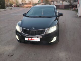 2011 Kia Rio 5-speed III, чёрный, 800000 рублей, вид 1