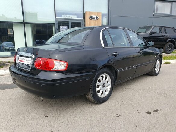2006 Kia Opirus I, чёрный - вид 2