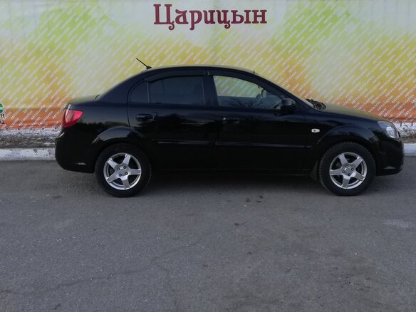 2011 Kia Rio II Рестайлинг, чёрный - вид 3