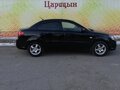 2011 Kia Rio II Рестайлинг, чёрный - вид 3