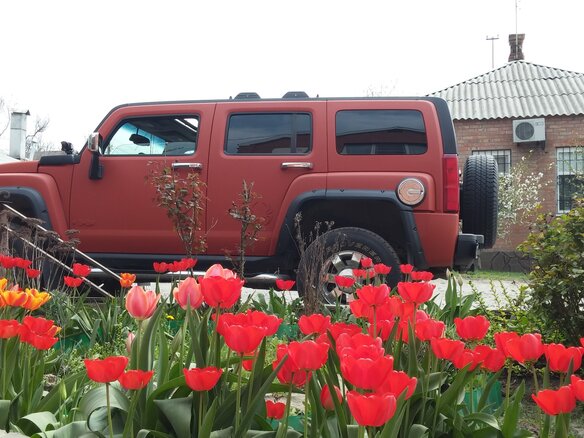 2005 Hummer H3, оранжевый - вид 1