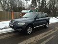 2004 Volkswagen Touareg I, серый - вид 1