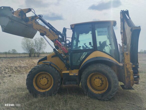 2014 Caterpillar 434F, жёлтый, 9850000 рублей - вид 2