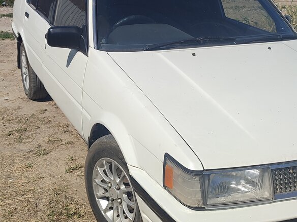 1985 Toyota Corolla V (E80), белый, 250000 рублей