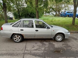 2011 Daewoo Nexia I Рестайлинг, серебристый, 170000 рублей, вид 3